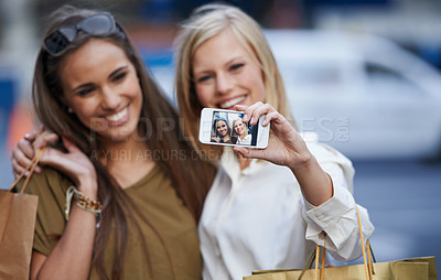 Buy stock photo Shopping hug, selfie and happy customer, friends or women with memory picture of Black Friday spree, sales or product purchase. Social media, city fashion or stylish female people smile for shop deal