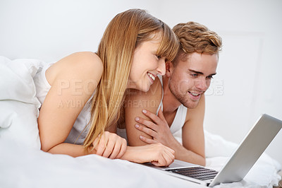 Buy stock photo Happy, couple and relax with laptop in bed, watch movies and subscription for streaming in home. Online, man and woman together in bedroom reading with computer on website, blog or media on internet