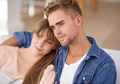 Buy stock photo Couple, bonding and embrace on couch in house, together and lovers in lounge, love and romance. Marriage, happiness and sofa with smile, hug and enjoy time with partner for comfort and relax