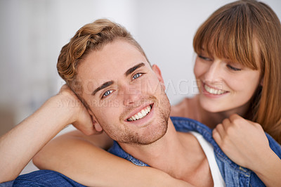 Buy stock photo Closeup, couple and together in house with smile on date and romance to enjoy. Man, love and hug by partner, cute and moment with pride on face and lovers in relationship with happiness in life