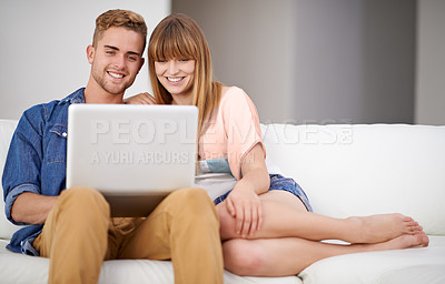 Buy stock photo Happy, couple and relax with laptop on sofa, watch movies and subscription for streaming in home. Online, man and woman together on couch reading with computer on website, blog or media on internet