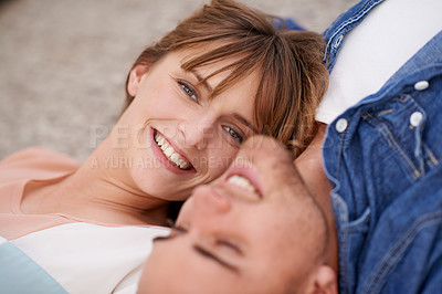 Buy stock photo Portrait, couple and love with care while lying down for affection at home. Man, woman and relax in relationship with bonding and romance in a calm and peaceful house for leisure with smile on floor
