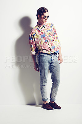 Buy stock photo Fashion, unique and funky with a hipster man in studio on a white background for contemporary style. Trendy, cool and edgy with a handsome young male model posing in stylish or fashionable clothes