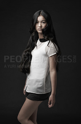 Buy stock photo Woman, portrait and fashion with confidence in studio or dark aesthetic or clothing style, black background or mockup space. Asian person, model and face or serious or Japanese beauty, cool or outfit