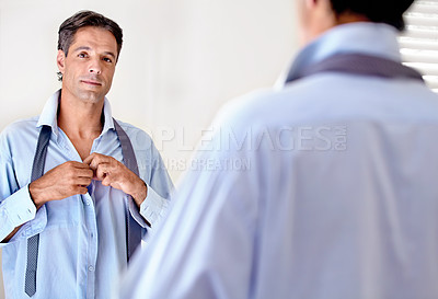 Buy stock photo Portrait, mature businessman mirror and getting ready for work or executive board. Shirt, fashion and corporate employee confident looking at his reflection whilst dressed in the morning in bedroom