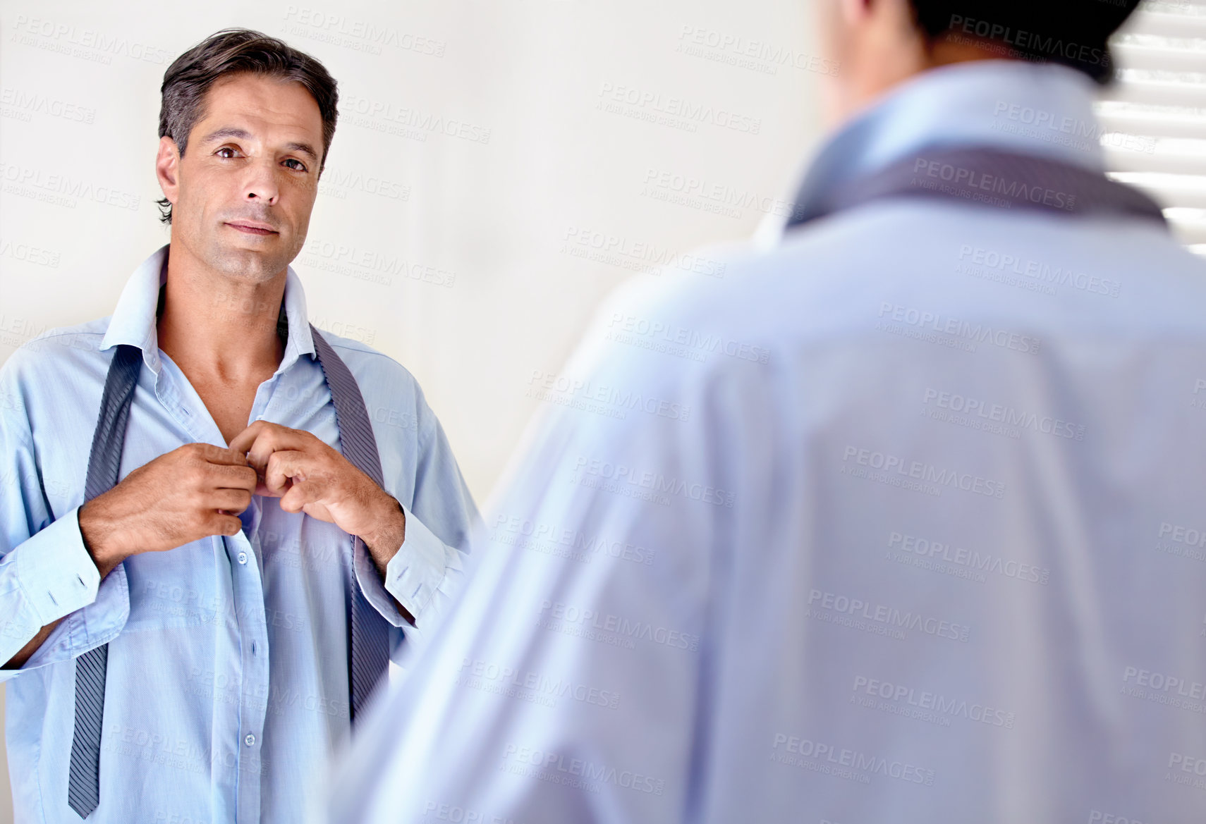 Buy stock photo Portrait, mature businessman mirror and getting ready for work or executive board. Shirt, fashion and corporate employee confident looking at his reflection whilst dressed in the morning in bedroom