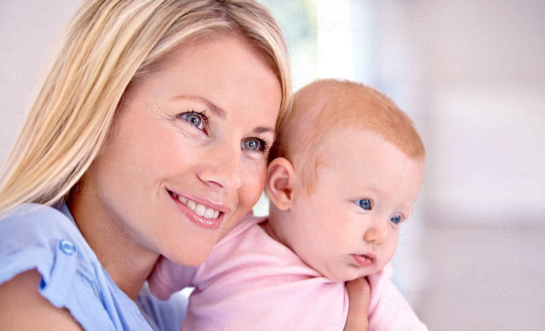 Buy stock photo Mother, child and smiling for love and embrace, bonding and security in connection at home. Mommy, daughter and happy while hugging on weekend, caring and family or affection, satisfaction for joy