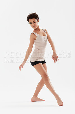 Buy stock photo Dance, ballet and woman on a white background for performance, fitness and training for theatre. Ballerina, dancer and isolated person pose for balance, creative routine and practice in studio