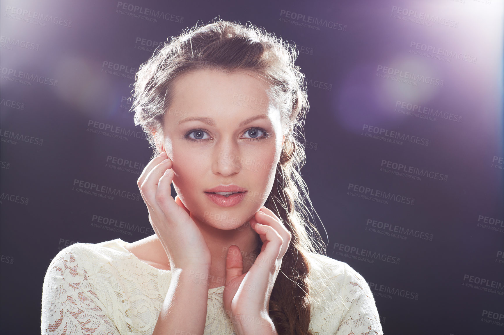 Buy stock photo A young elegant woman posing in a studio