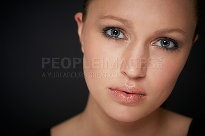 Buy stock photo Closeup studio portrait of a young woman with perfect skin