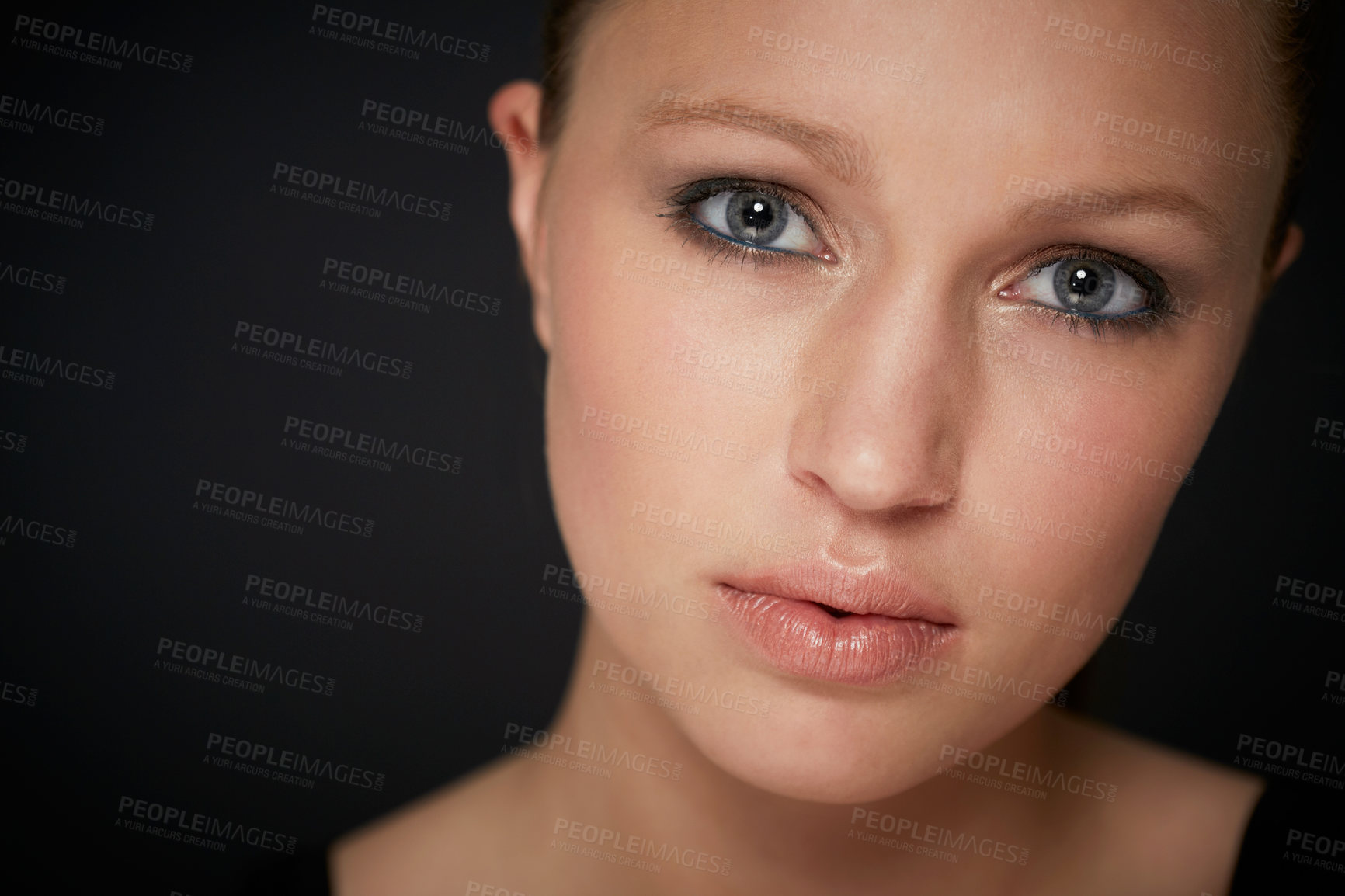 Buy stock photo Closeup studio portrait of a young woman with perfect skin