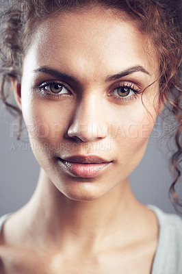 Buy stock photo Beauty, face and portrait of woman in studio confident, beautiful and gorgeous on gray background. Salon, attractive and closeup of female person with natural makeup, cosmetics and curly hairstyle