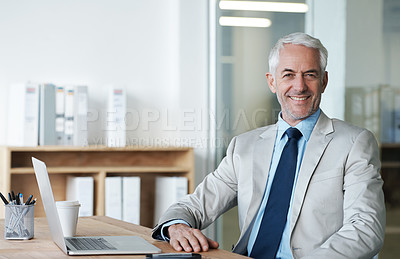 Buy stock photo CEO, businessman and laptop at desk, portrait and work for lawyer firm. Senior executive, office and smile at company, suit and success in corporate workspace for attorney and insurance lawyers
