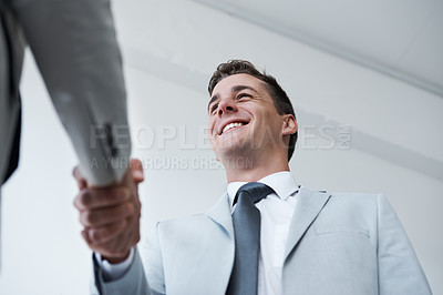 Buy stock photo shot of two businessmen shaking hands