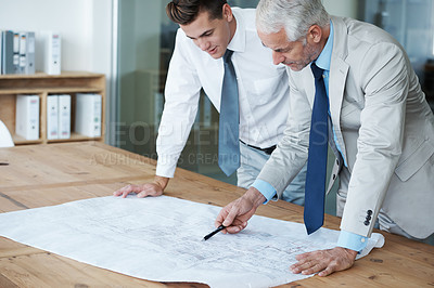 Buy stock photo CEO, architect and boss with blue print, plan and work for expanding in office and building. Manager, employer and designer at table, company and meeting for remodeling of business and renovation