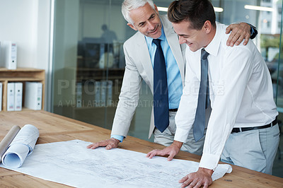 Buy stock photo Boss, manager and architect with embrace, plan and vision for expanding in office for space. Executive, employer and blueprint at desk, company and meeting for renovation idea in project for ceo