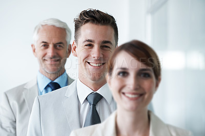 Buy stock photo Smiling , friendly group of three businesspeople , and of different age private company staff posing for office portrait. Diverse business partners , team of colleagues professionals working office 