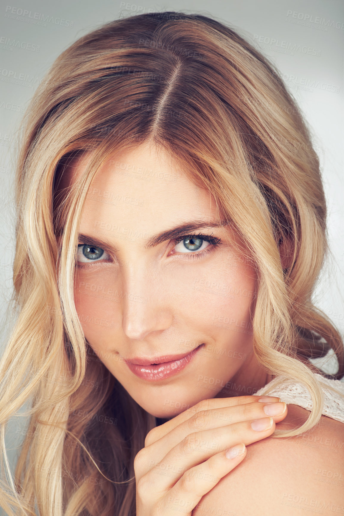 Buy stock photo Beauty, skincare and portrait of woman in studio for cosmetics, satisfaction and facial. Self care, glow and shine with face of female model on grey background for clean, natural makeup and spa