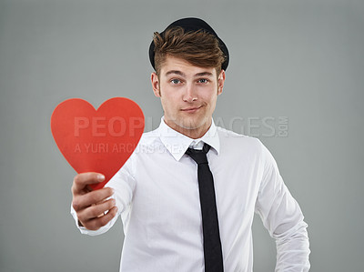 Buy stock photo Portrait, man and heart in studio holding greeting card for Valentines day, romantic and mockup. Hopeful, trendy guy and gen z hipster with shirt, tie and smile against light grey background