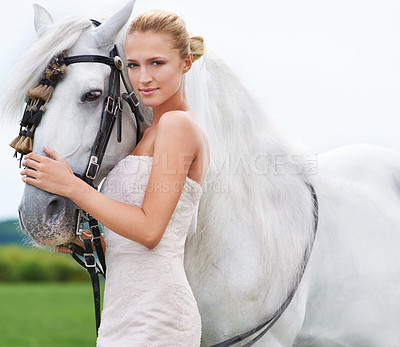Buy stock photo Bride, horse and field with portrait, event and animal for marriage, celebration and happiness. Woman, uk countryside and meadow with spring, sky and nature for wedding, love and relationship