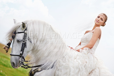 Buy stock photo Wedding, woman and riding with horse or portrait outdoor with happiness for celebration, marriage and confidence. Bride, person and stallion on lawn in field with smile, dress and animal at ceremony