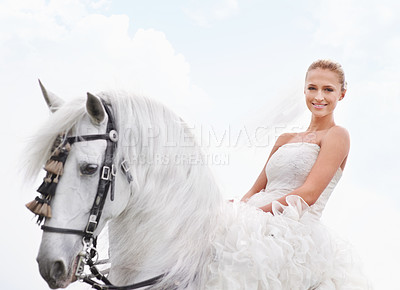 Buy stock photo Bride, woman and riding with horse or portrait outdoor with happiness for celebration, marriage and confidence. Wedding, person and stallion on lawn in field with smile, dress and animal at ceremony