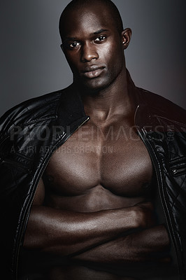 Buy stock photo A handsome african man modeling clothes in studio