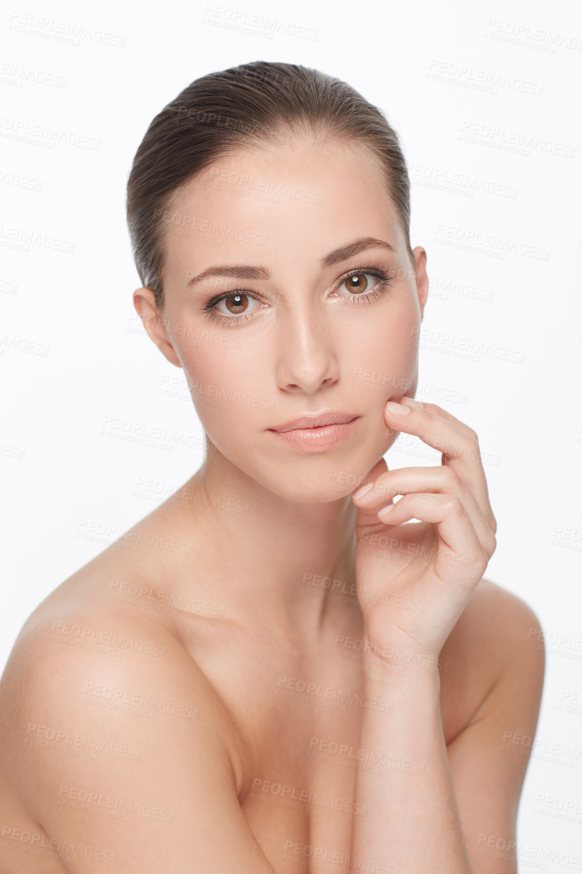 Buy stock photo Cropped portrait of a nude young woman with flawless skin against a white background