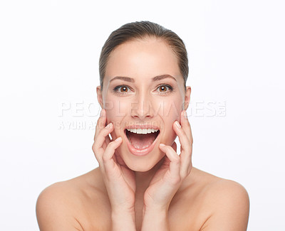 Buy stock photo Cropped view of a naturally gorgeous young woman touching her skin