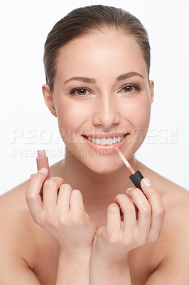 Buy stock photo Woman, portrait and skincare for beauty, lipstick and makeup with cosmetology and wellness on white background. Face, cosmetic product for lips and clean skin, glow or shine with smile in studio