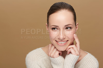 Buy stock photo Face, skin and woman is thinking, beauty in studio with dermatology and wellness on brown background. Skincare, mockup space and natural cosmetics with female model and healthy, glow and happiness