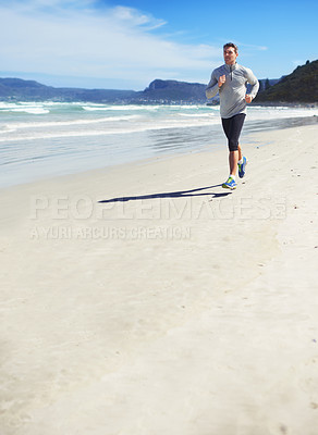 Buy stock photo Sand, space or man at sea running for exercise, training or outdoor workout at beach for fitness. Sports person, mature runner or healthy athlete in nature for cardio endurance, wellness or mockup