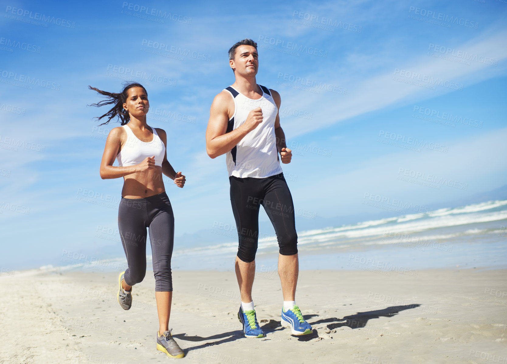 Buy stock photo Fitness, teamwork or couple on beach running for exercise, training or outdoor workout at sea. Sports people, runners or healthy athletes in nature for cardio endurance, wellness or challenge on sand