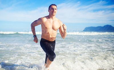 Buy stock photo Man, running and water by a beach with fitness, sport and training for marathon by the sea. Workout, exercise and back of a athlete with health and wellness outdoor of runner with cardio in summer