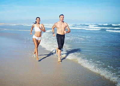 Buy stock photo Running, beach and couple with fitness, cardio and weekend break with sunshine and training for health. Runners, seaside and man with woman or workout with practice and activity for wellness or hobby