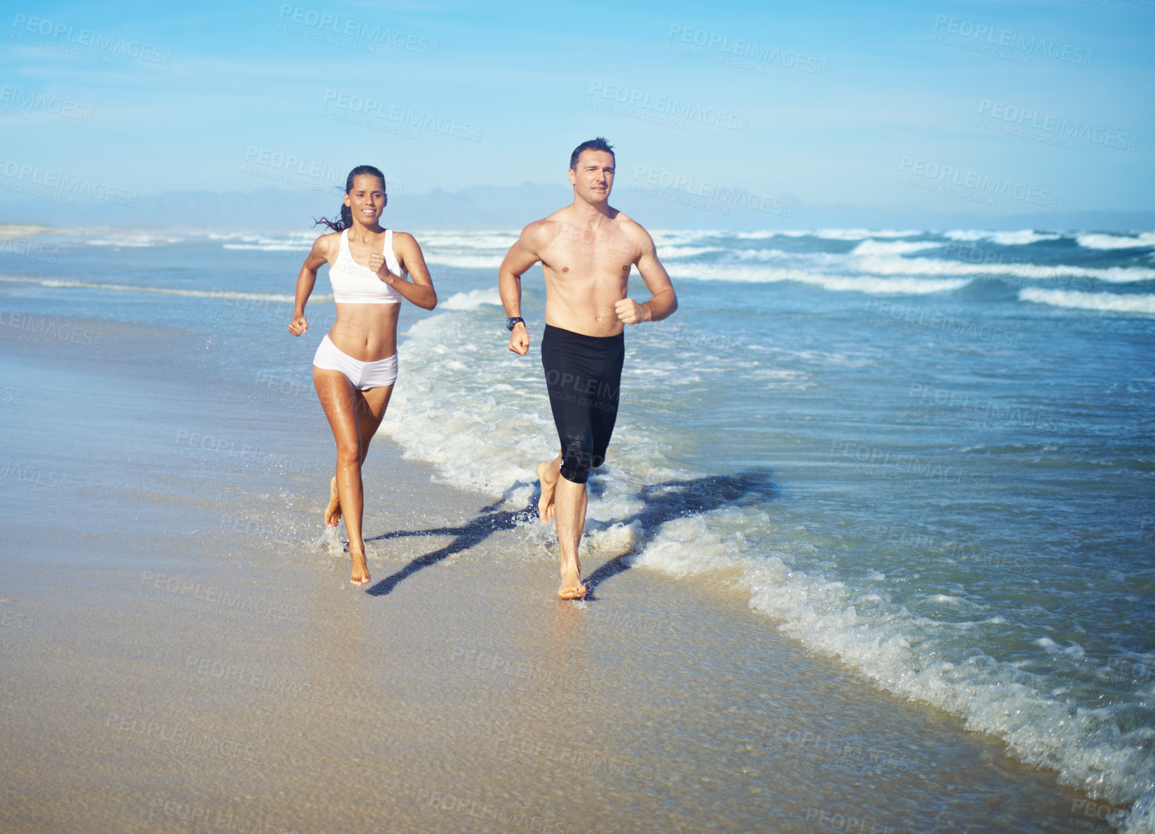 Buy stock photo Running, beach and couple with fitness, cardio and weekend break with sunshine and training for health. Runners, seaside and man with woman or workout with practice and activity for wellness or hobby