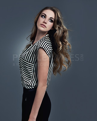 Buy stock photo A studio shot of a trendy young woman