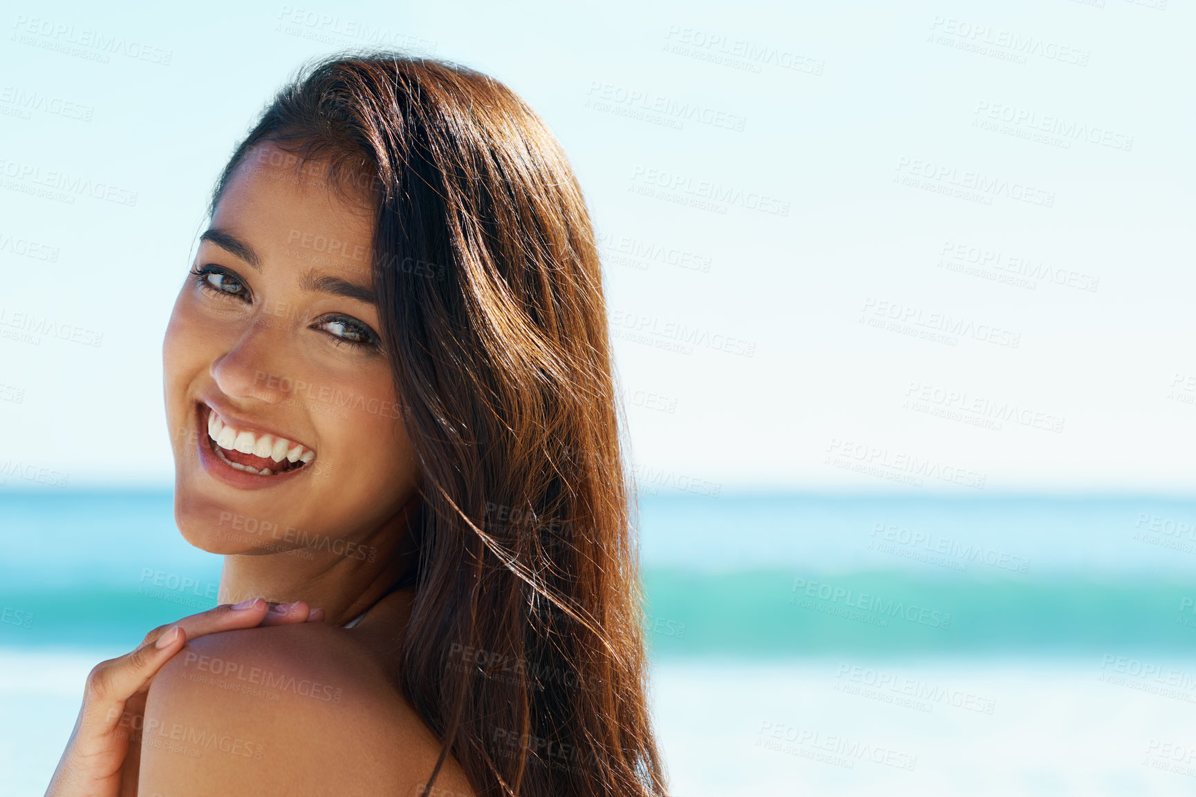 Buy stock photo Woman, beach and happy in portrait with space for mock up, holiday and promotion with sunshine by ocean. Girl, person and smile by sea, outdoor and relax in summer for vacation on tropical island