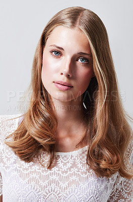 Buy stock photo Portrait, woman and natural beauty in studio for haircare, makeup or skincare cosmetics for teenager, teen or girl. Person, serious or face for cosmetic, facial or model with hair care and confidence