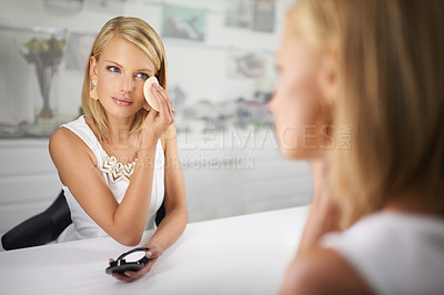Buy stock photo Woman, beauty and makeup by mirror, sponge and stylish outfit in dressing room for shoot. Female person, blush and eyeshadow for cosmetic campaign, reflection and fashion to prepare for interview
