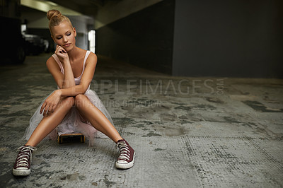 Buy stock photo Parking lot, ballet and woman with skateboard and sneakers for edgy fashion, trendy outfit and hipster style. Thinking, aesthetic and ballerina on floor for dance hobby, sports and skating skill