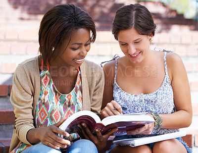 Buy stock photo Studying, university and women on steps with books on campus for learning, knowledge and reading. Education, happy friends and students with textbook for information, exam preparation and college