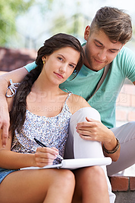 Buy stock photo Students, couple and book with woman on stairs with smile, hug and portrait with notes at university. People, studying and scholarship for knowledge, education and notebook with embrace at college