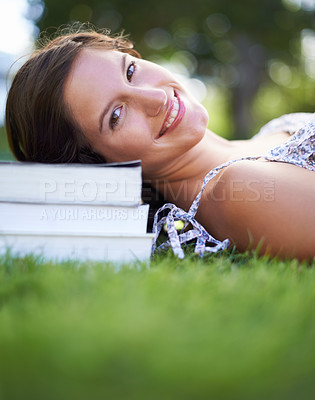 Buy stock photo Books, park and portrait of woman relax, happy and resting for studying, reading and learning. Education, university and person outdoors for wellness, fresh air and peace with textbooks for knowledge