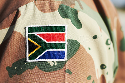 Buy stock photo Cropped closeup shot of a South African flag on a soldier's uniform
