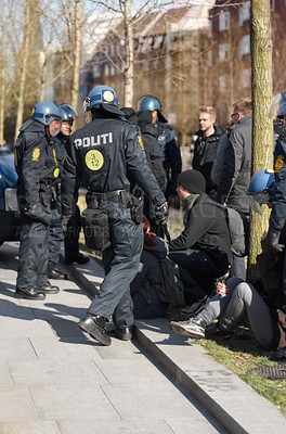 Buy stock photo Police men, strike and security in the city of Norway for street safety, service or law enforcement. Group of government politi officers doing their job in a urban town for crime, justice or riot