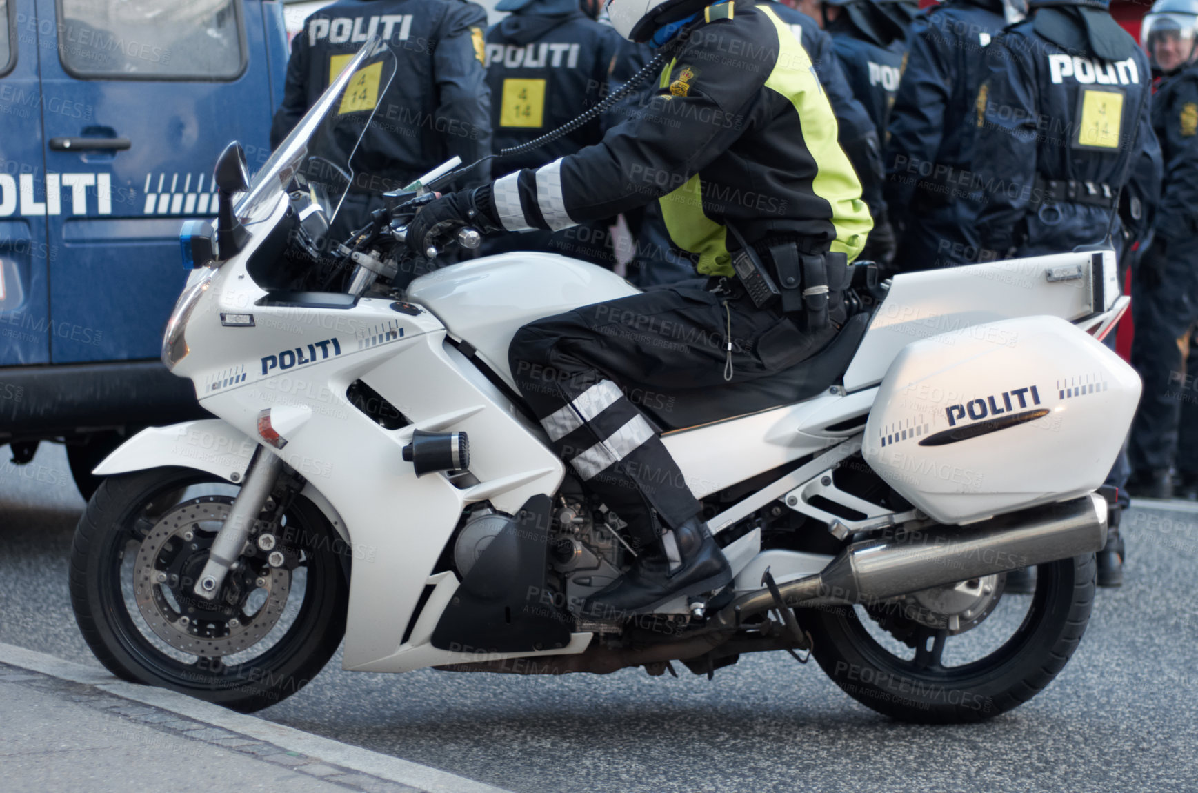 Buy stock photo Emergency, road and motorcycle police officer working for protection and peace in an urban town in Denmark. Security, traffic and legal professional or policeman on a motorbike ready for service