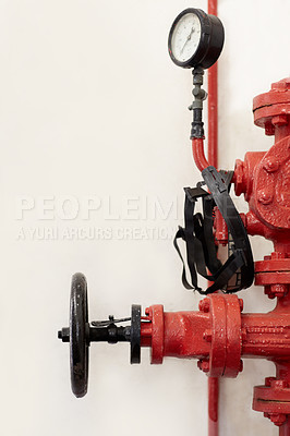 Buy stock photo Fire station, hydrant or pump for emergency with faucet, valve or gauge to control water pressure. Metal firefighter equipment, health and safety tools for public services by wall background for help