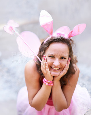 Buy stock photo Portrait, outdoor and woman with bunny ears, fairy and party with Halloween outfit and social gathering. Face, person and girl with sunshine and weekend break with happiness and costumes with a smile