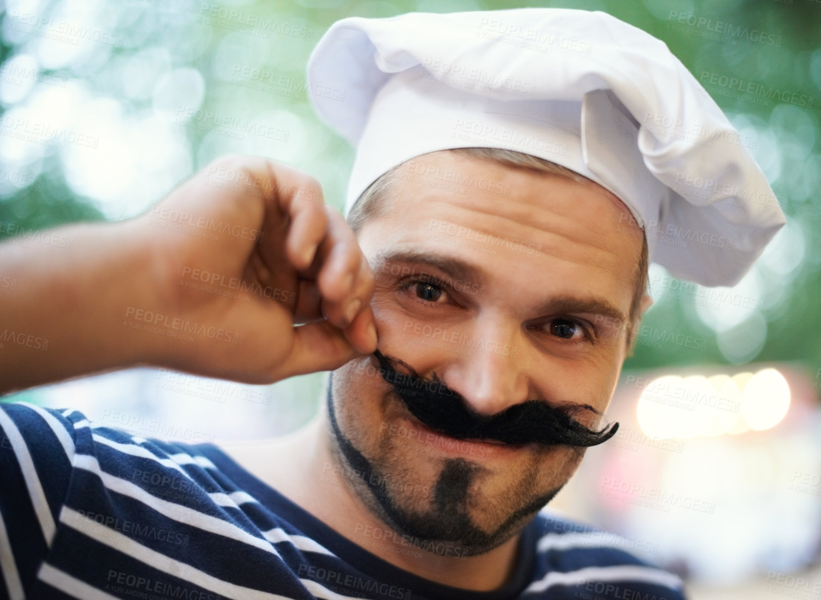 Buy stock photo A young man dressed up in a beret and a fake mustache